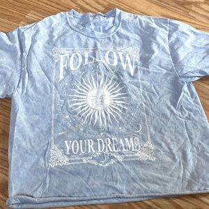 a small blue shirt from acemi